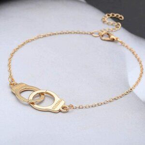 UNLOCK ME Gold Tone "Freedom" Handcuffs Bracelet